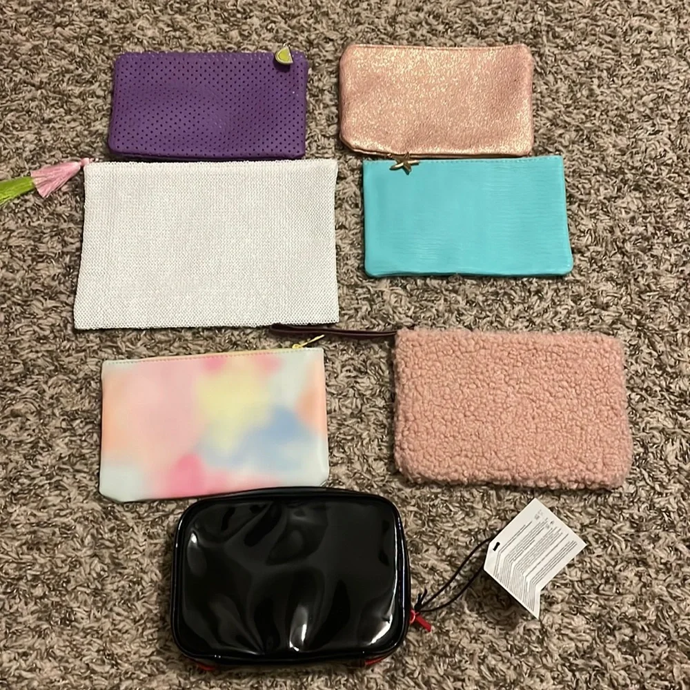 Lot of seven new make up bags